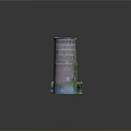 Ruined Red Brick Tower With Partial Wall Collapse And Green Plants At Base