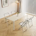 Modern Dining Table Set With White Table And Transparent Chairs On Wooden Floor With Flower Vase