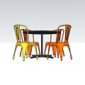 Modern Round Black Dining Table With Four Yellow And Orange Metal Chairs