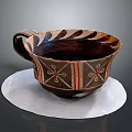 Handcrafted Decorative Cup Featuring Brown Red Black Patterns On White Circular Mat 3d model
