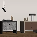 Modern Bedside Tables With Map Patterned Surface Light Colored Drawers And Decorative Items