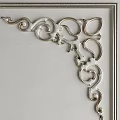 White Background Wall with Golden Carved Border and Black Rock Texture Chipping Revealing Behind