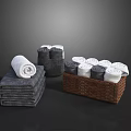 Soft Gray And White Bath Towel Collection Stacked And Rolled In Wicker Basket