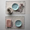 Stylish Dinnerware Set With Polka Dot Plates Brown Napkins Woven Placemats And Cutlery
