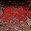 Scenic Cave Interior With Rock Formations Stalactites Stalagmites Ground Stones And Vegetation