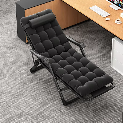 Comfortable Black Quilted Lounge Chair With Adjustable Back In Office Setting 3d model