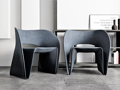 Two Modern Leisure Chairs With Curved Dark Sleek Design In Interior 3d model