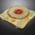 Golden Flaky Baked Square Pastry Topped With Pineapple Slice And Red Cherry