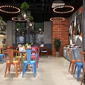 Stylish Restaurant Interior With Colorful Chairs Dining Tables Green Plant Wall And Hanging Lights