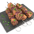 Grilled Meat Skewers with Onions and Chopped Green Onions on Black Slate Plate