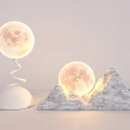 Illuminated Moon Shaped Table Lamps With Spiral Stand And Mountain Base Design