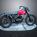 Vintage Motorcycle With Red Tank Black Seat And Classic Design Showcase