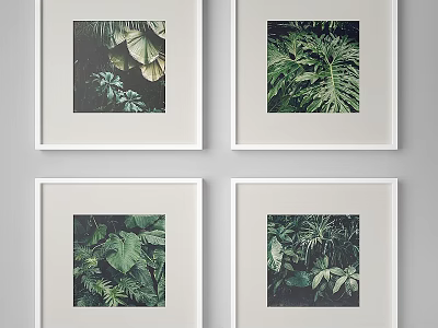 White Photo Frames With Green Plant Leaf Prints On Gray Wall 3d model