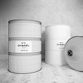 Industrial Equipment With Black White Chanel N°5 Perfume Barrels For Eau De Parfum Toilette