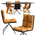 Modern Table and Chair Set With Orange Cushions And Black Geometric Frame Design