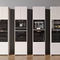 Neatly Arranged Kitchen Appliances In White Tall Cabinets With Oven And Coffee Maker