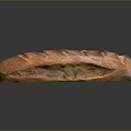 Freshly Baked Long Loaf Bread With Golden Brown Crust And Slash Marks