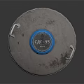 Silver Metallic Barrel With Blue Lid And A3OT Marking On Dark Surface