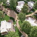 Scenic Waterfront Residential Community With White Houses Surrounded By Lush Green Trees
