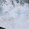 Snowy Mountain Terrain with Snow Covered Peaks Rocky Ridges and Frozen Landscape