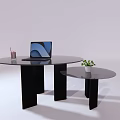Modern Round Tables With Laptop Cup And Small Green Plant On Surface