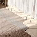 Light Brown and Gray Woven Square Rug on Herringbone Light Wood Floor with White Curtains