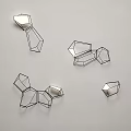 Modern Abstract Geometric Metal Sculptures With Angular Design Elements On White Background