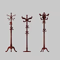 Classic Carved Wooden Coat Racks With Decorative Designs And Sturdy Bases