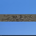 Intricate Metal Carving With Floral And Bird Patterns On Decorative Panel