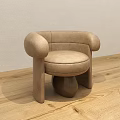 Beige Modern Single Seater Sofa With Rounded Armrests And Ball Shaped Legs On Wooden Floor