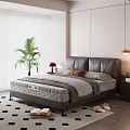 Gray Leather Double Bed with Bedside Table Lamp and Green Plant on Checkered Floor