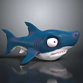 Cartoon Shark Character Toy With Blue Body Big Eyes White Belly Open Mouth And Teeth