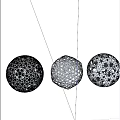 Floral Display Decoration Featuring Three Metallic Hollow Spheres With Intricate Designs
