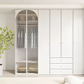 Modern White Wardrobe With Glass Doors And Drawers In Bright Bedroom Setting