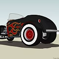 Vintage Black Convertible Car with Flame Design Large Red Rims and White Tires