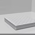 Supportive Quilted Mattress With Diamond Pattern And White Surface In Bright Room