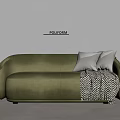 Green Two Seater Sofa with Light Pillows and Black White Geometric Blanket on Light Wall