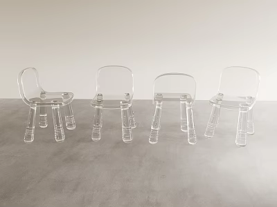 Four Clear Acrylic Leisure Chairs Placed On Gray Floor Against Light Colored Wall 3d model