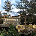 Modern Homestay Building Surrounded By Trees And Snowy Mountain Views