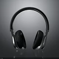 Sleek Modern Electronic Over Ear Headphones With Soft Black Ear Cushions And Textured Headband