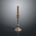 Decorative Candlestick With Tall Beige Candle And Ornate Base Design