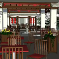 Traditional Restaurant Entrance With Red Beam Lanterns White Columns And Green Door