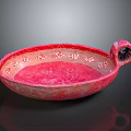 Pink Decorative Ceramic Bowl With Intricate Patterns And Curved Handle Design