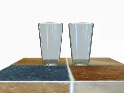 Two Transparent Glass Cups For Kitchen Use On Colorful Tiled Tabletop 3d model
