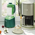 Green Blender And Silver Coffee Maker On Kitchen Countertop By Window 3d model