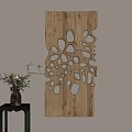 Wooden Wall Decor Featuring Natural Texture Hollow Design With Floral Vase On Black Side Table