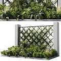 Decorative Lattice Fence Surrounded By Lush Green Plants Between Pillars