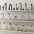 Various Styles of Modern Faucets in Different Colors Displayed on Shelves