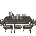 Outdoor Wooden Dining Table and Chairs Set With Woven Seats and Potted Plant