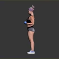 Woman Lifting Dumbbells In Black Sports Bra Gray Shorts And White Sneakers